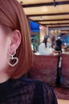 European and American fashion exaggerated pearl heart-shaped earrings, elegant Internet celebrity personality, silver needle versatile earrings, 2021 new trend Application Scenario